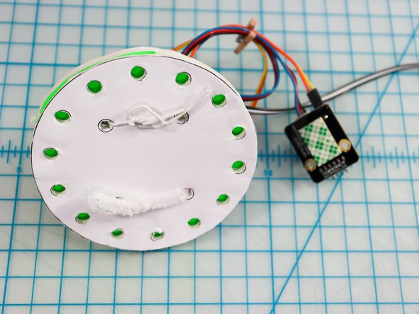 Place the Bit Board over the holes on the opposite side of the 14 holes, so those holes appear on the bottom.