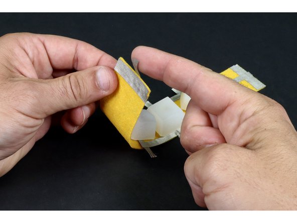 Peel and stick the remaining long Maker Tape path so it connects to the end of the last piece placed on this side and goes toward the edge opposite the battery.