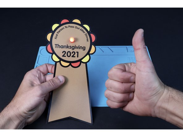 NOTE: Connecting this final tape path will compete your circuit and turn the LED on the opposite side ON, while peeling it back will turn the LED OFF.