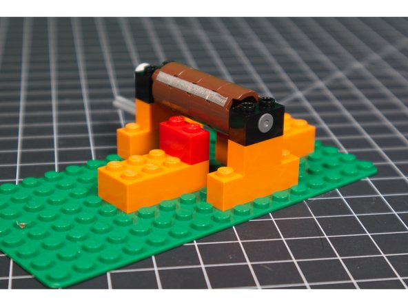 Notice the position of the cylinder in relation to the bricks on the base. We need the cylinder to be able to make contact with the tape we'll be adding.