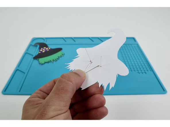 Fold the longer inner LED legs flat against the project in a slight &quot;V&quot;.