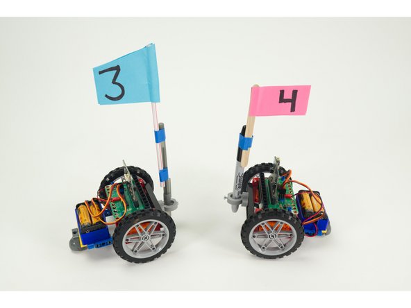 Attach the Pen Holder to the front of the Rover using two black pins.