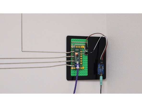 We decided to mount our board about belt high to the right side of our graphics so we could more easily access power and set our speakers on an end table. If you've got small children you can easily mount this up high or down low.