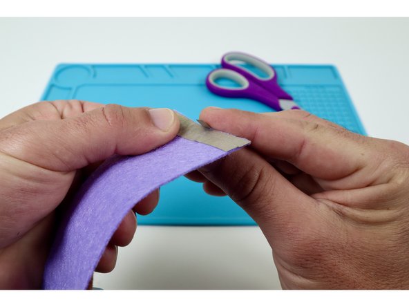 Stick that path in place as shown in photo 2 and curl the tag end around to the back.