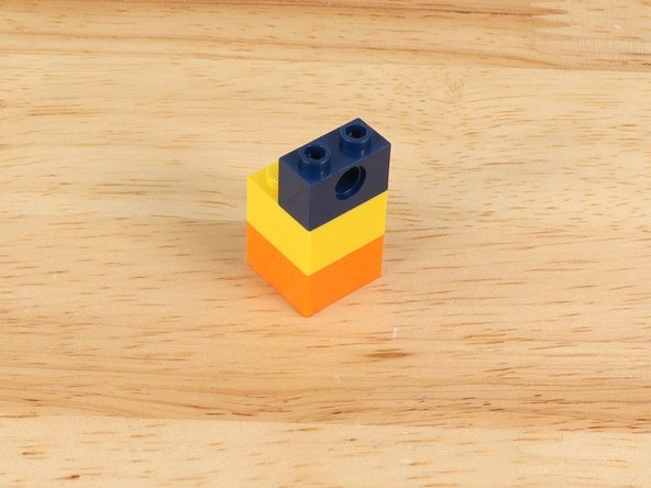 We used two small LEGO bricks and a LEGO Technic Brick 1 x 4 with Holes (3701).