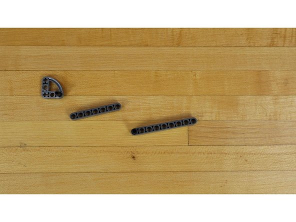 Assemble the LEGO parts to build the gate arm.