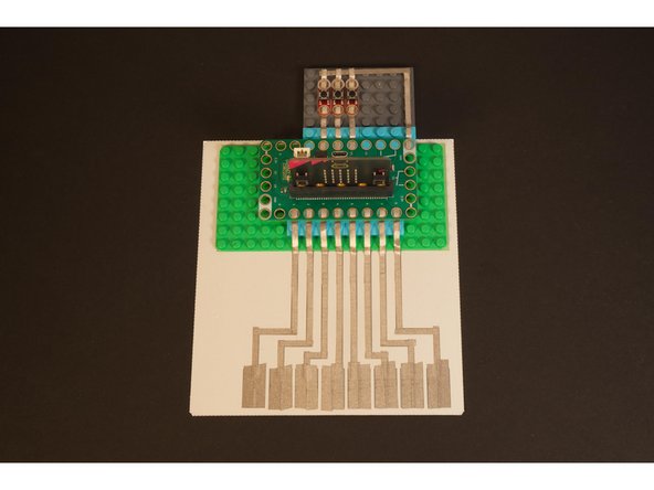 An 8 x 16 LEGO baseplate is perfect for this project. You’ll also need a few LEGO plates or bricks.