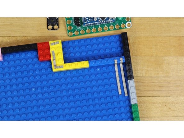 Apply the tape so that the ends go to Pin D0 and the Ground Pin on the Robotics Board.