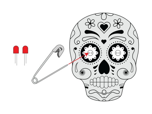 Use a safety pin or a thumbtack to poke holes for the LED legs to go through.