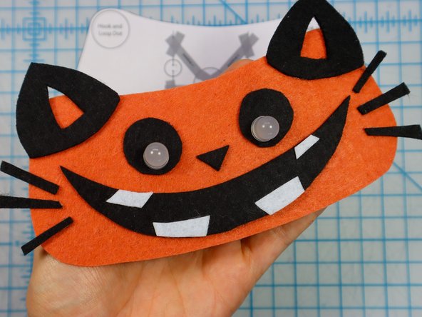 Insert each LED through the holes with the longer, positive leg in the top hole.