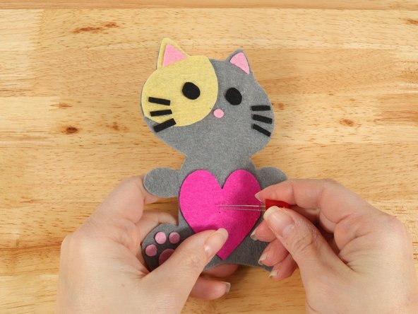 Add the LED by pushing the legs through the holes.