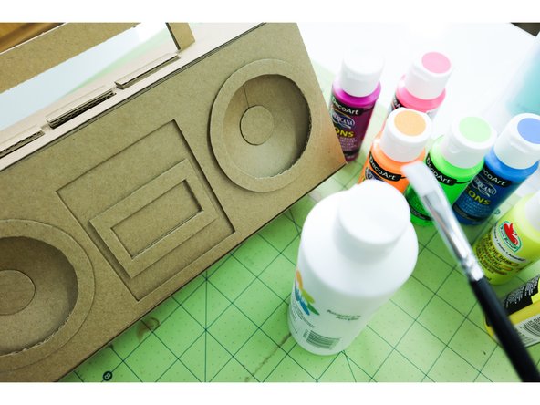 Paint the BoomBox.  I used 3 layers of neon paint on top of one layer of white paint to make it pop!