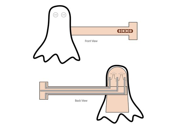 Glue your paper ghost onto the ghost backing piece of cardboard, and then attach the arm to that.