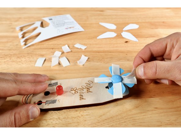 Peel the remaining backing from each of the foam tape pieces, revealing the second sticky side.