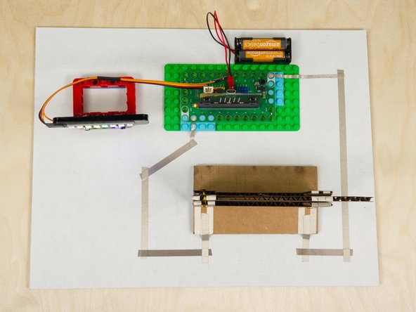 Here's a micro:bit project (using our Bit Board) that connects a knife switch between Pin 0 and Ground. The NeoPixel strip is connected to Pin 13 on the Bit Board.