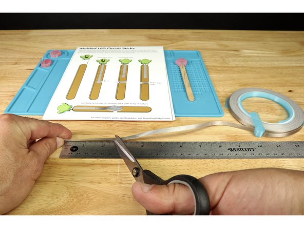 Cut two pieces of Maker Tape: 1 that is 2.5&quot; long and another that is 1.5&quot; long.