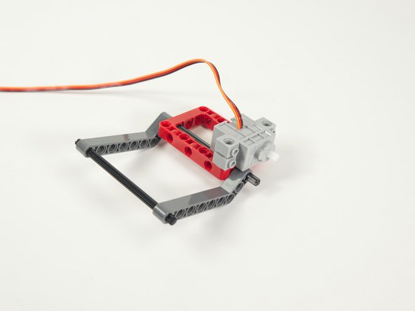 Note that the shaft of the servo is towards the back of the Lifter and the wires are on top of the servo.