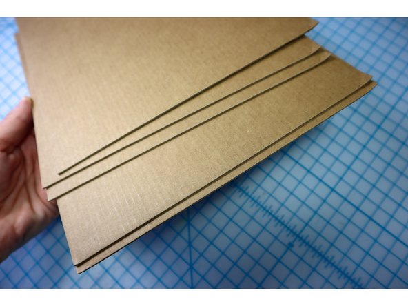 We've found that the best material for this project is cereal boxes (also look for similar household packaging like swiffers or soda 12 pack containers.)