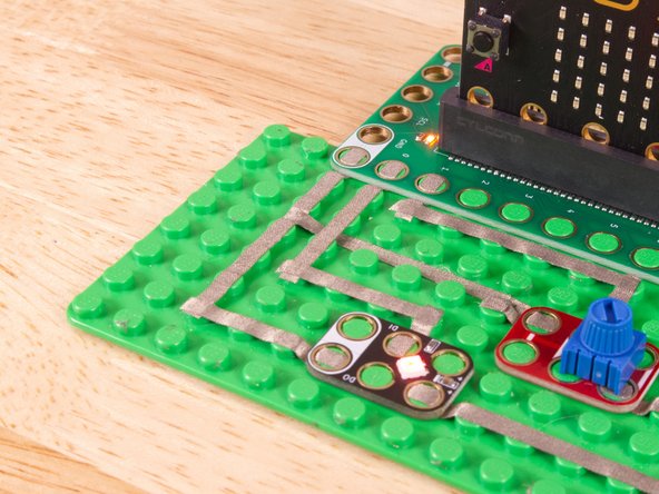 See the photos to show how this works. It's a technique we'll use for certain projects. It can also be used when you're tight on space for tape paths.