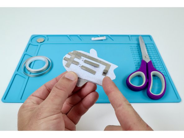 Place that Maker Tape Loop atop the end of the end of the path leading from the Short LED Legs as shown in photo 3.