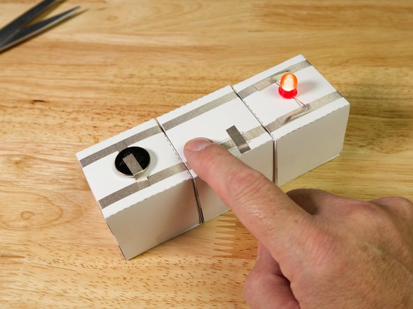 Our Paper Circuit Lever Switch is a good one to start with. You can also try the Push Button.