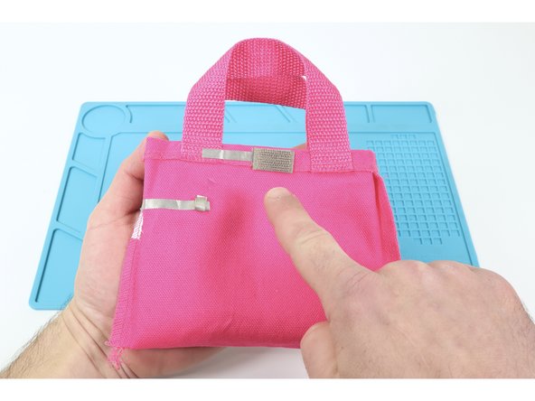 Using one of the three methods described in our Conductive Hook &amp; Loop guide (included at the end of the featured document), attach Conductive Hook on one side atop one of the upper Tape Loops and the Conductive Loop atop the remaining upper tape loop. 