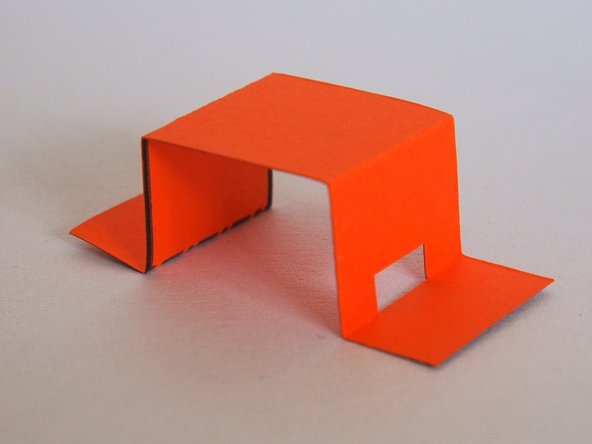 Fold the servo holder.