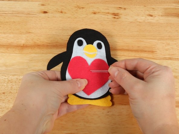 Add the LED by pushing the legs through the holes.