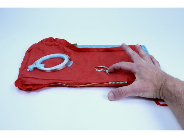 Sticking the opposite end of this new piece of Maker Tape to the top of the the battery will complete the circuit and turn the LED accent on. Peeling it back will turn the accent off.