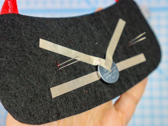 Insert each LED through the holes with the longer, positive leg in the top hole.