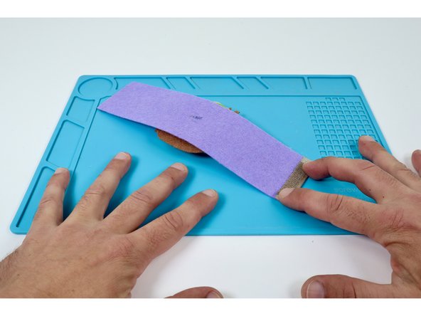 Press the remaining half of your conductive hook and loop atop the edge pad.