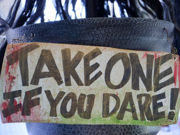 Attach it to the cauldron with wire.