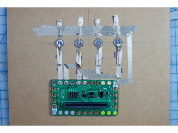 Connect each positive leg of the LEDs to pins 9, 10,  12, and 13. Don't use Pin 11 as it is reserved for another process on the micro:bit.