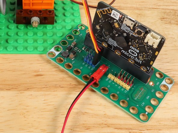 With our LEGO build complete we can add in our Bit Board and micro:bit so we can control things.