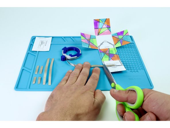 Measure and cut the 7 pieces of Maker Tape indicated on the circuit diagram. Remember: although there are only 6 paths, you will need one tape length to make a tape loop for the battery where indicated on the diagram.
