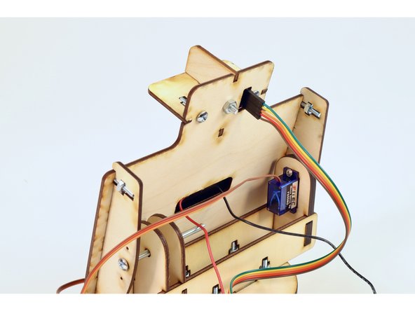 NOTE: The following instructions reference these wires' position from "top to bottom". However, if you prefer to reference the designators (names) for these pins (found on the front side of the photo resistor circuit board) or just need a different visual, use the downloadable wiring guide found at the top of this guide.