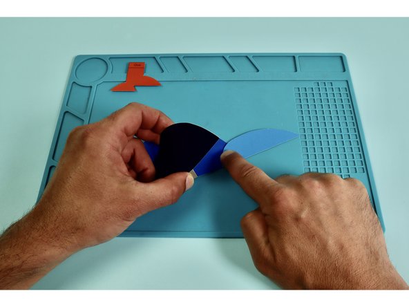 Use glue to assemble the tail, wing, feet, and beak to the body.