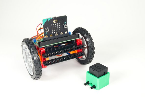 The Spy Camera Mount has LEGO Technic holes on the bottom and the back, so you can easily mount it to any Technic Beam... or the front of your Rover!