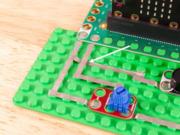 See the photos to show how this works. It's a technique we'll use for certain projects. It can also be used when you're tight on space for tape paths.