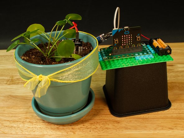 Warning! Water and electronics do not mix! While the Moisture Sensor is meant to be in wet soil, water should not touch other parts of your electronics. Be careful around the probe wires, the control board, and your micro:bit