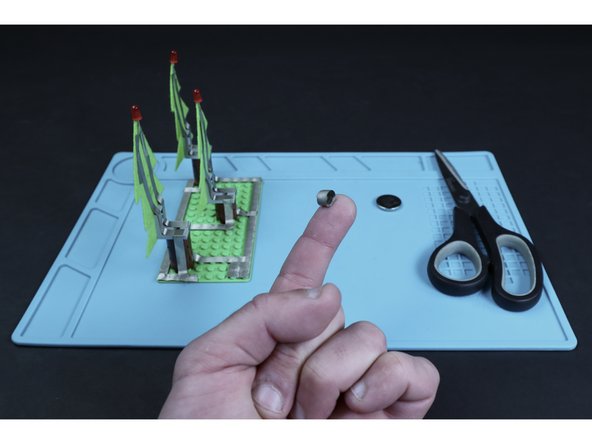Cut a small piece of Maker Tape and make a tape loop.