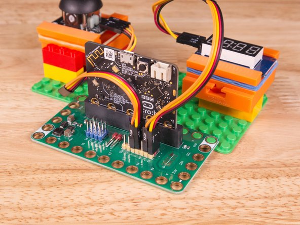 We can then plug the Orange wire labeled S2 into Pin 14 on the Bit Board.