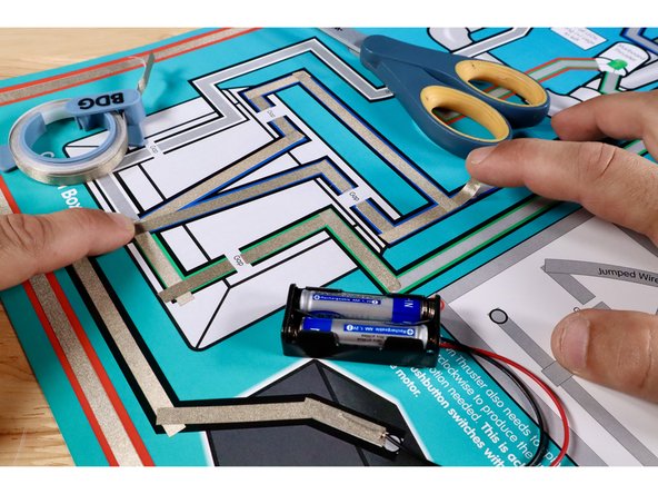 Measure, cut, peel, and stick the 4 Maker Tape paths shown to complete the green path out of the control box. Take care to leave a tape-free gap where shown.