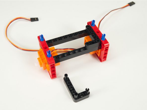 Press the L-shaped beams into place.