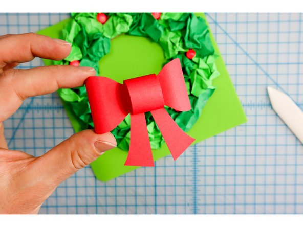 I used the bow template to cut a paper bow and glued it in place.