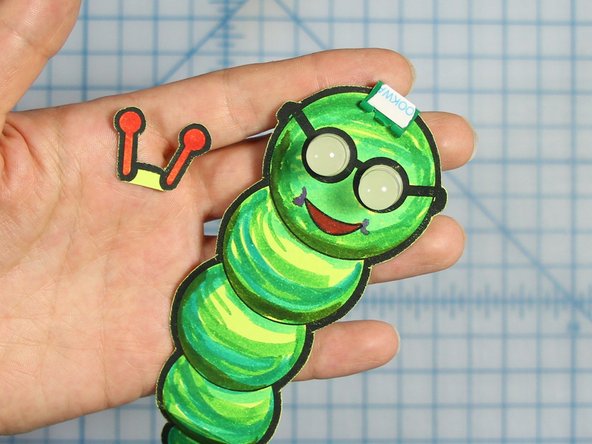 Glue your antenna in place on top of the binder clip.