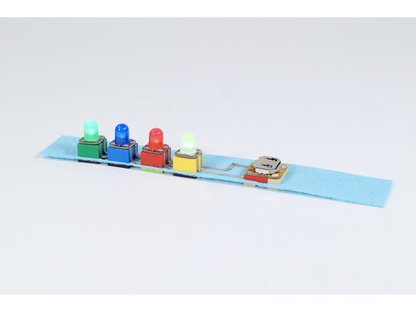 Make a multi-colored 4 LED light up bracelet using a piece of felt along with some LEGO bricks and Crazy Circuit parts.