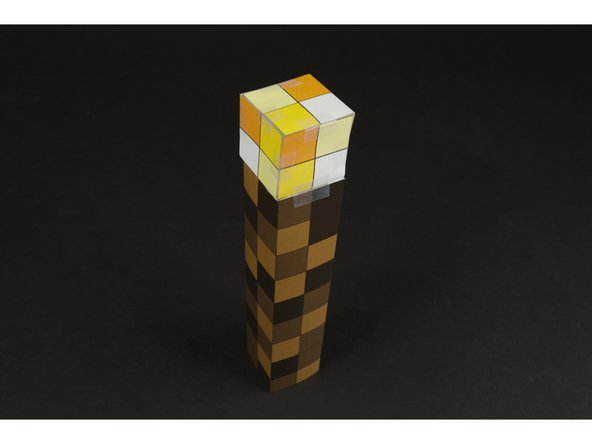 Fold the edges together and use tape to attach them.