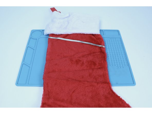 Flip your project over to the side opposite the battery pack.