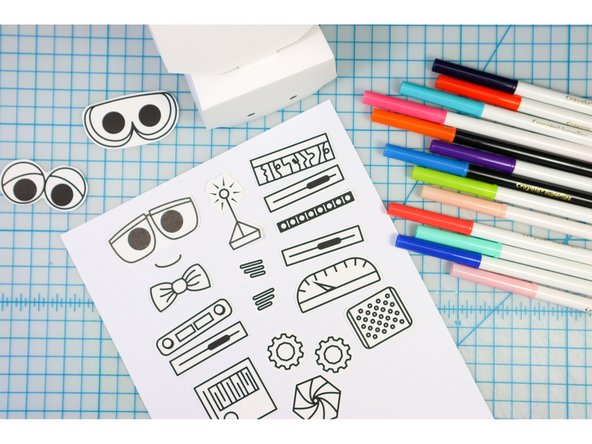 Color them, then glue them to the Bot's body.